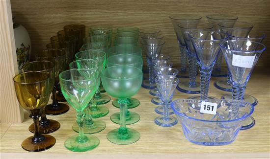 A collection of mixed blue and green and amber glassware tallest 16.5cm